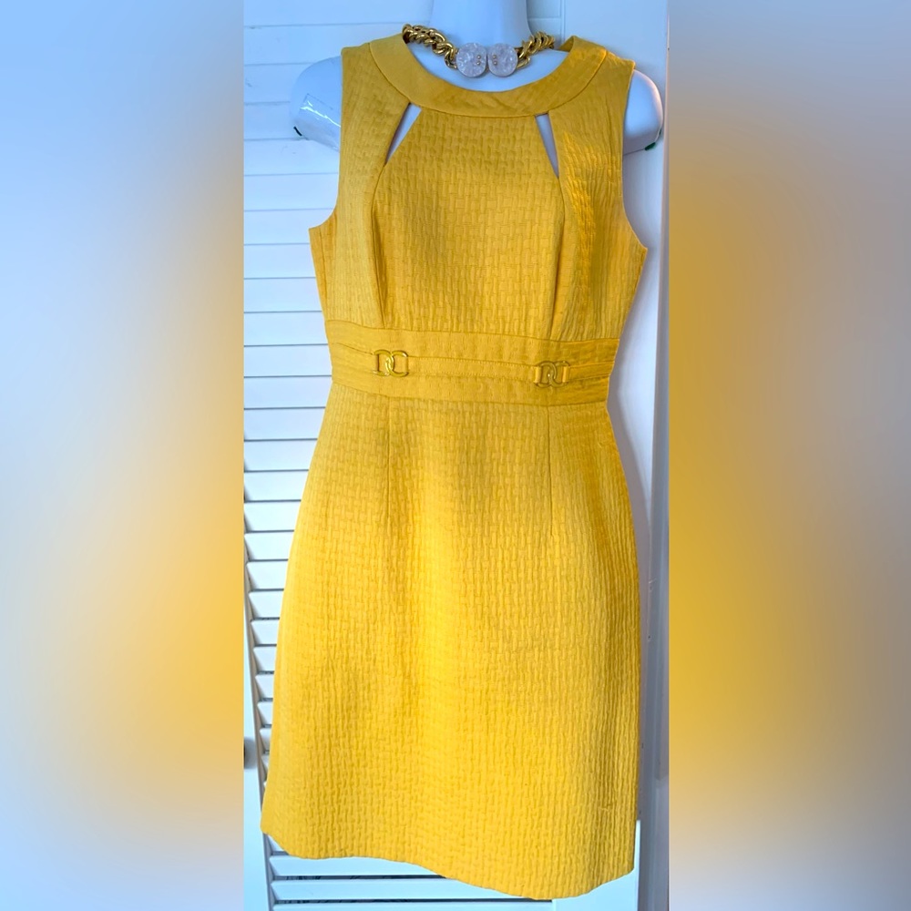 Bright yellow Tahari dress with neckline cutouts